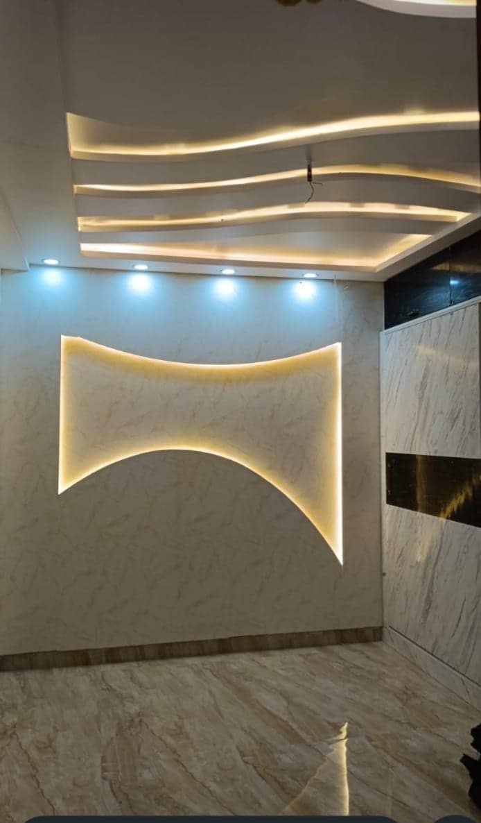 Completed interior fit-out by SKML showing a modular kitchen and false ceiling in a Visakhapatnam apartment
